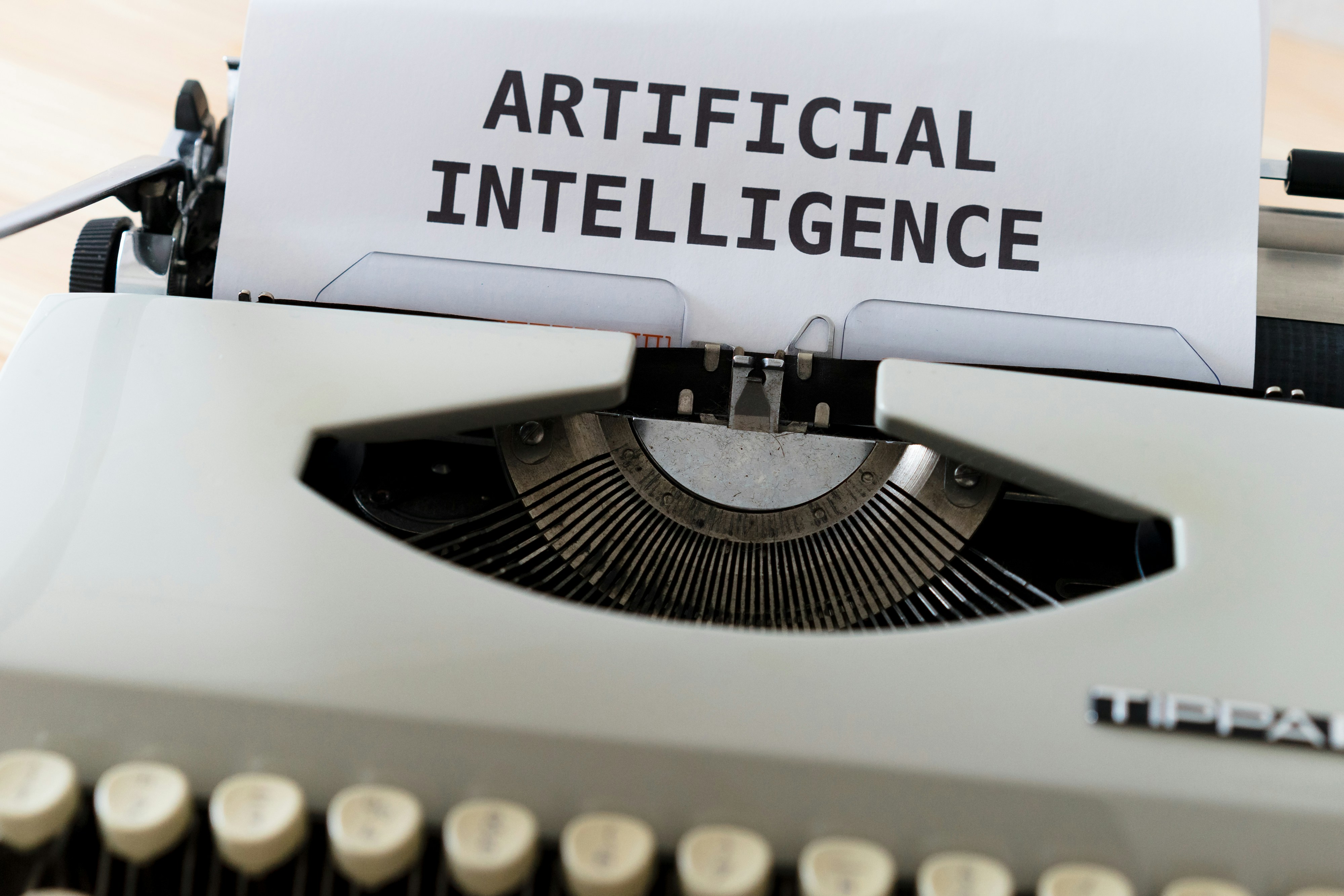 Business professional using AI tools on a modern workstation